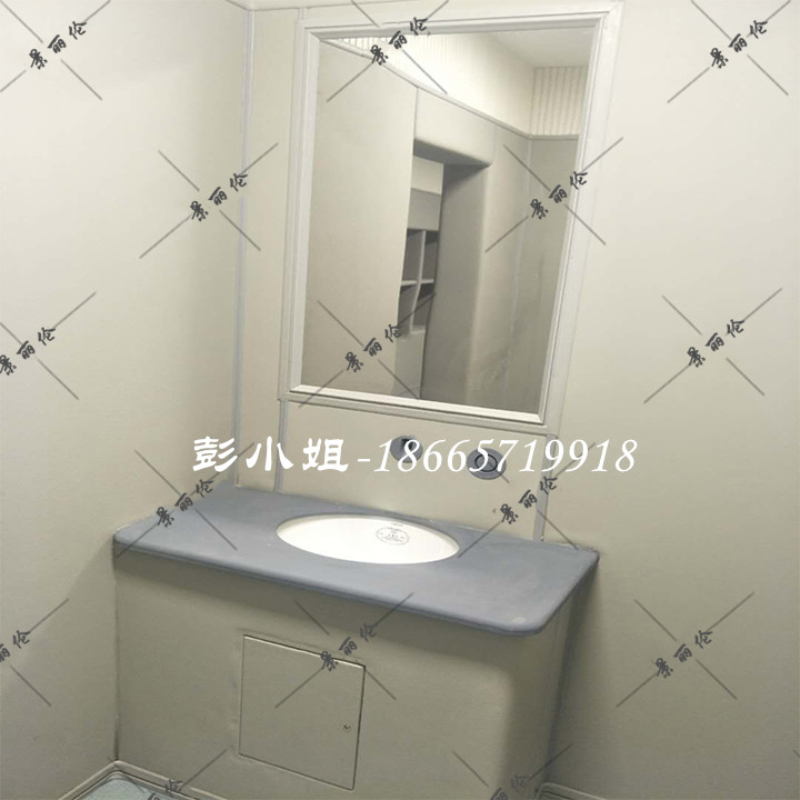办案区审讯室防撞软包卫浴间,蓝灰皮革包覆洗手台嵌入白色圆形盆,软包墙面防自伤设计